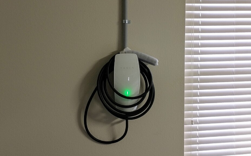 Tesla wall charger installed in christchurch home garage.