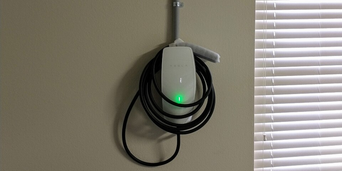 Tesla EV charger installed in a residential garage in Christchurch