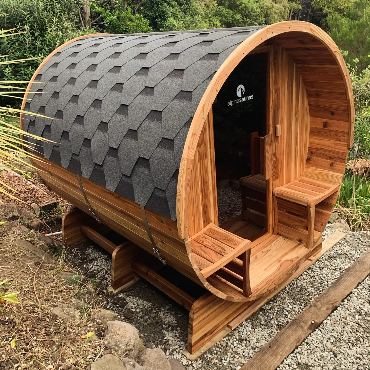 Outdoor barrel sauna with electrical power supply installed