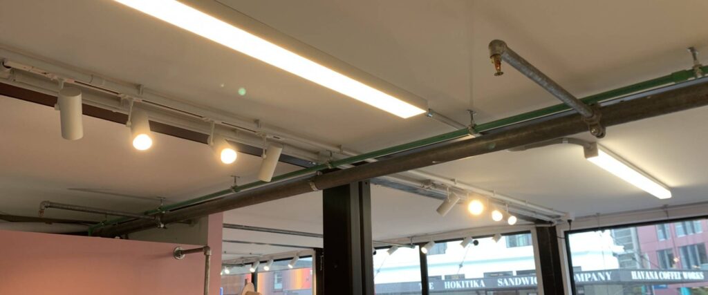 Bright, energy-efficient shop lights installed by Easy Electrical in a Christchurch clothing store – clear, even lighting for retail spaces