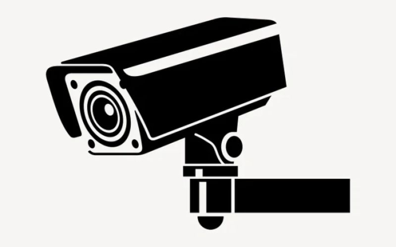 Toon graphic of wall-mounted CCTV camera for home security.