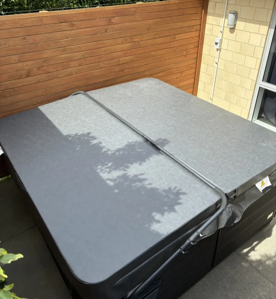 Outdoor spa with dedicated electrical isolator installed