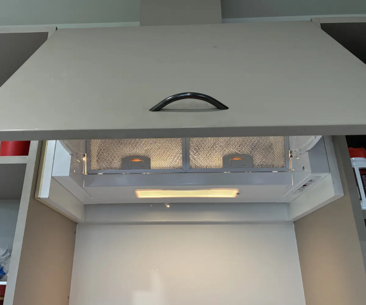 Tilt-style kitchen rangehood replacement in Christchurch.