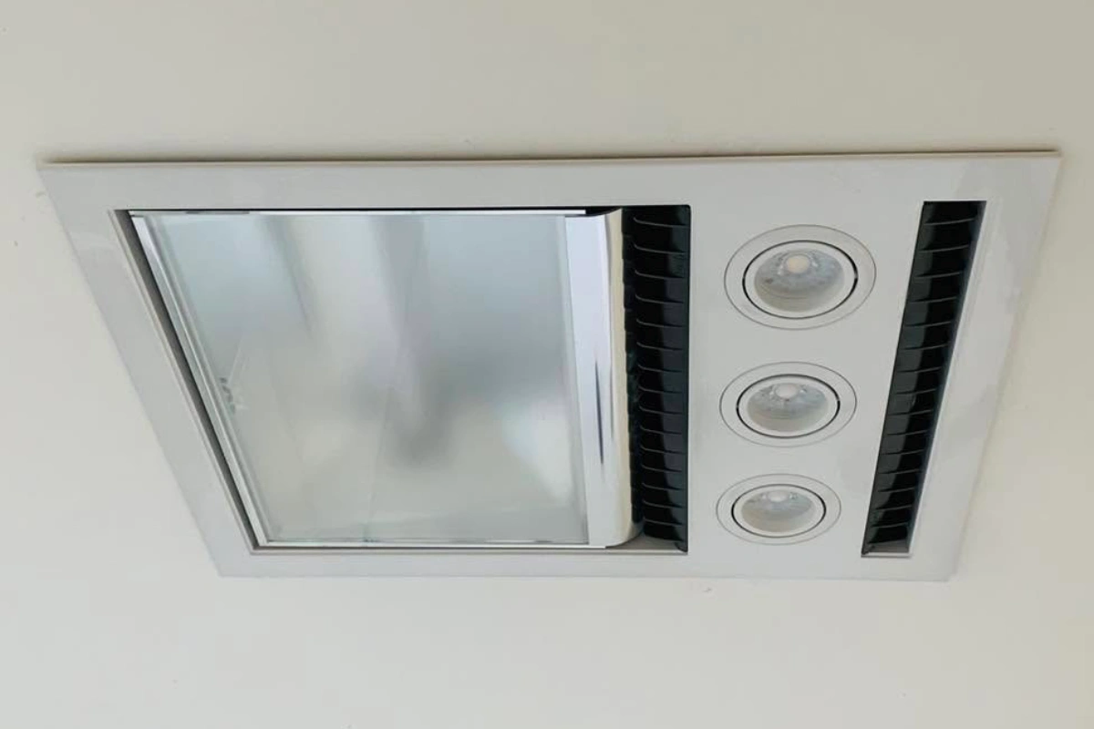 Modern designer 3-in-1 bathroom extractor fan unit installed in Christchurch home