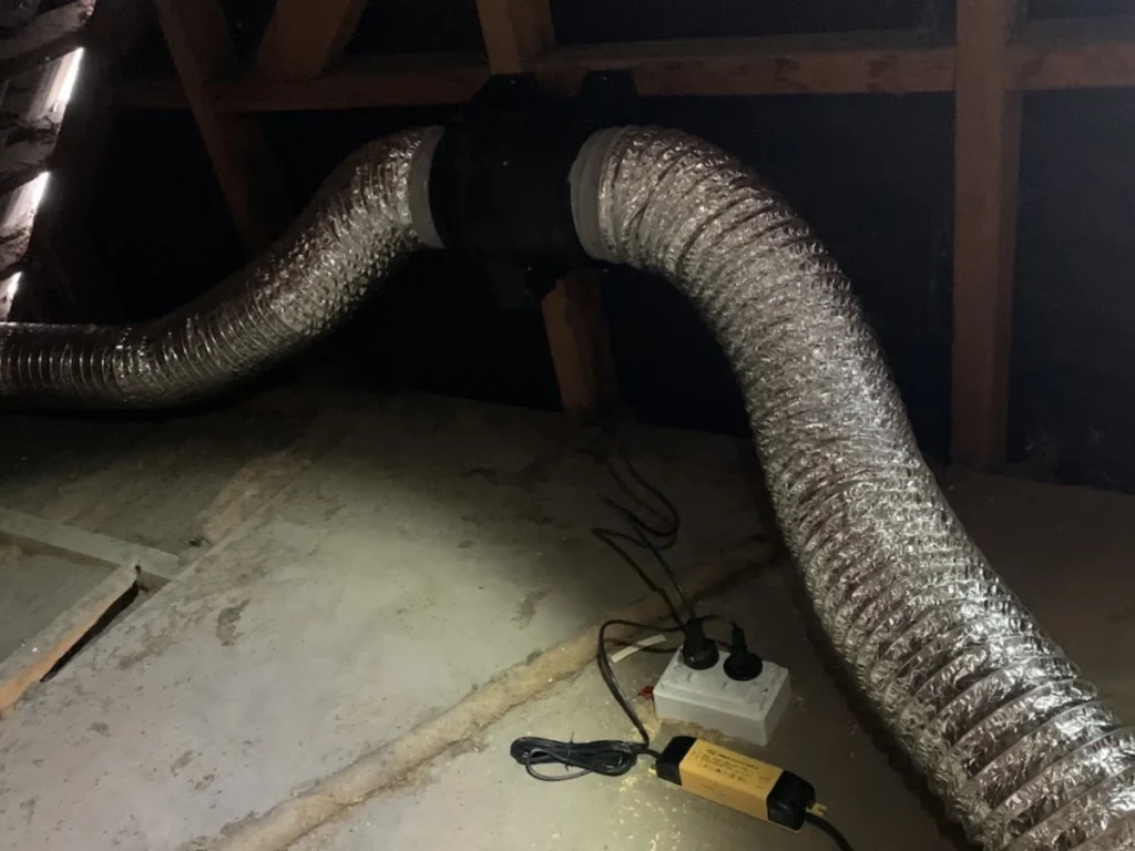 Inline bathroom extractor fan installed in a Christchurch roof space